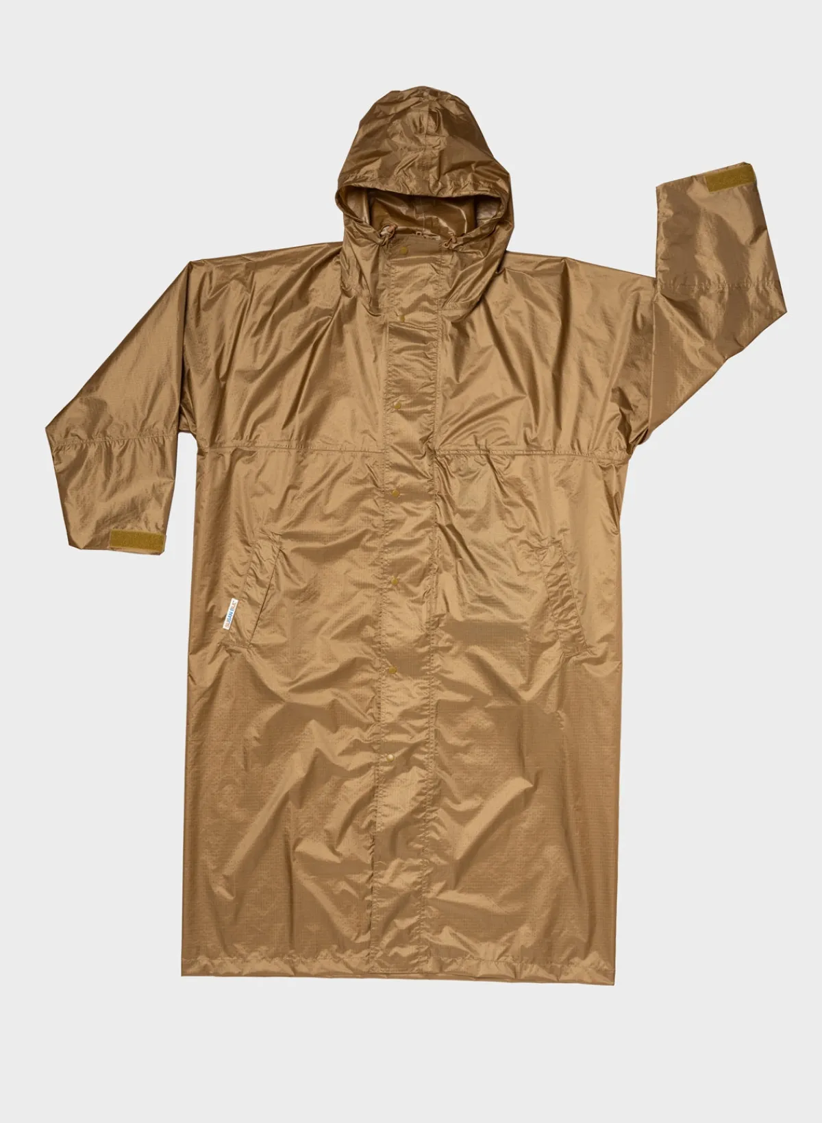 camel_0.webp SUSAN BIJL < The New Raincoat